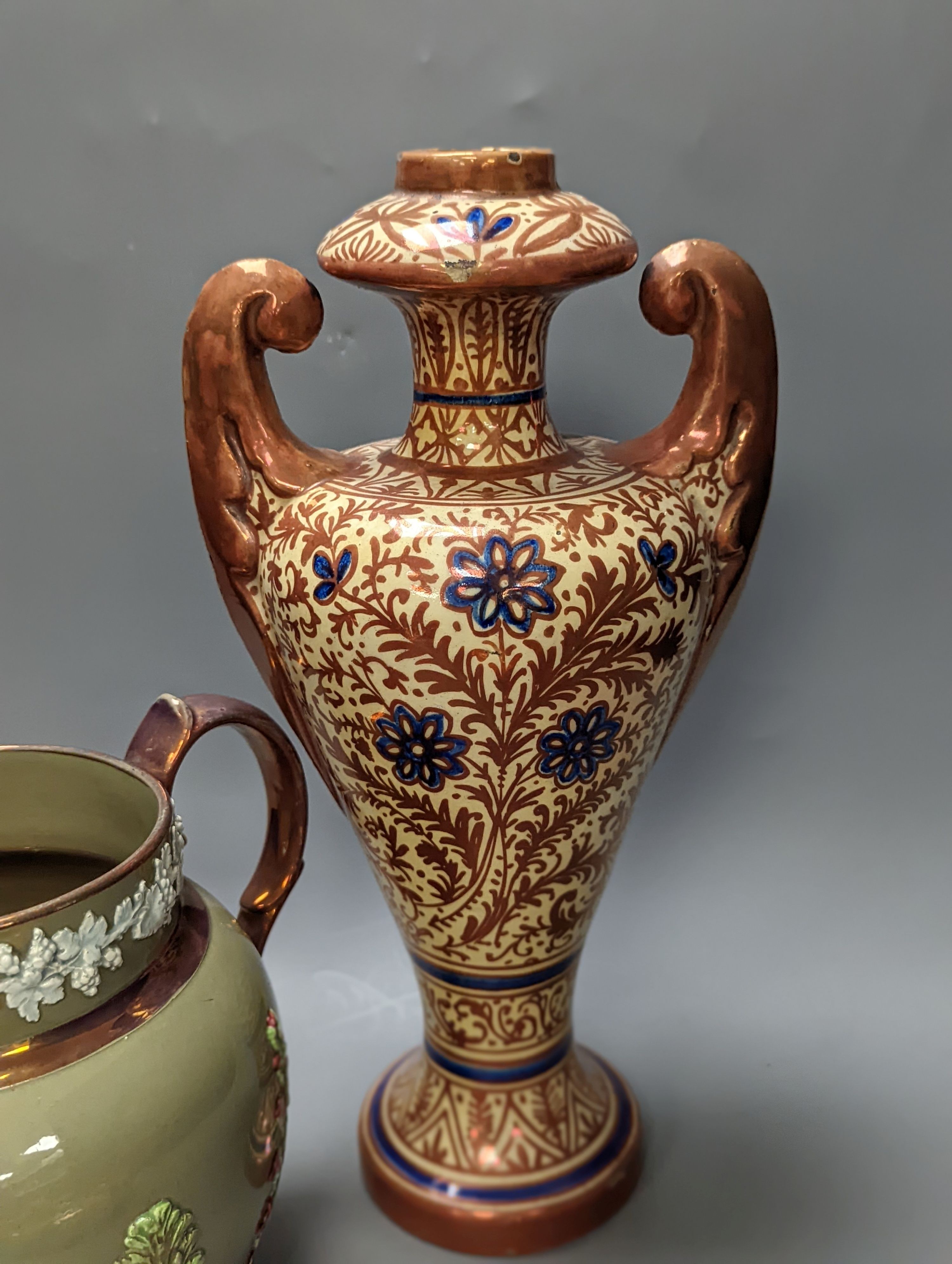 A Burley ware lustre dragon bowl, a lustre and fox glove designed jug and a Hispano-Moresque style copper lustre vase, Vase 38 cms high.